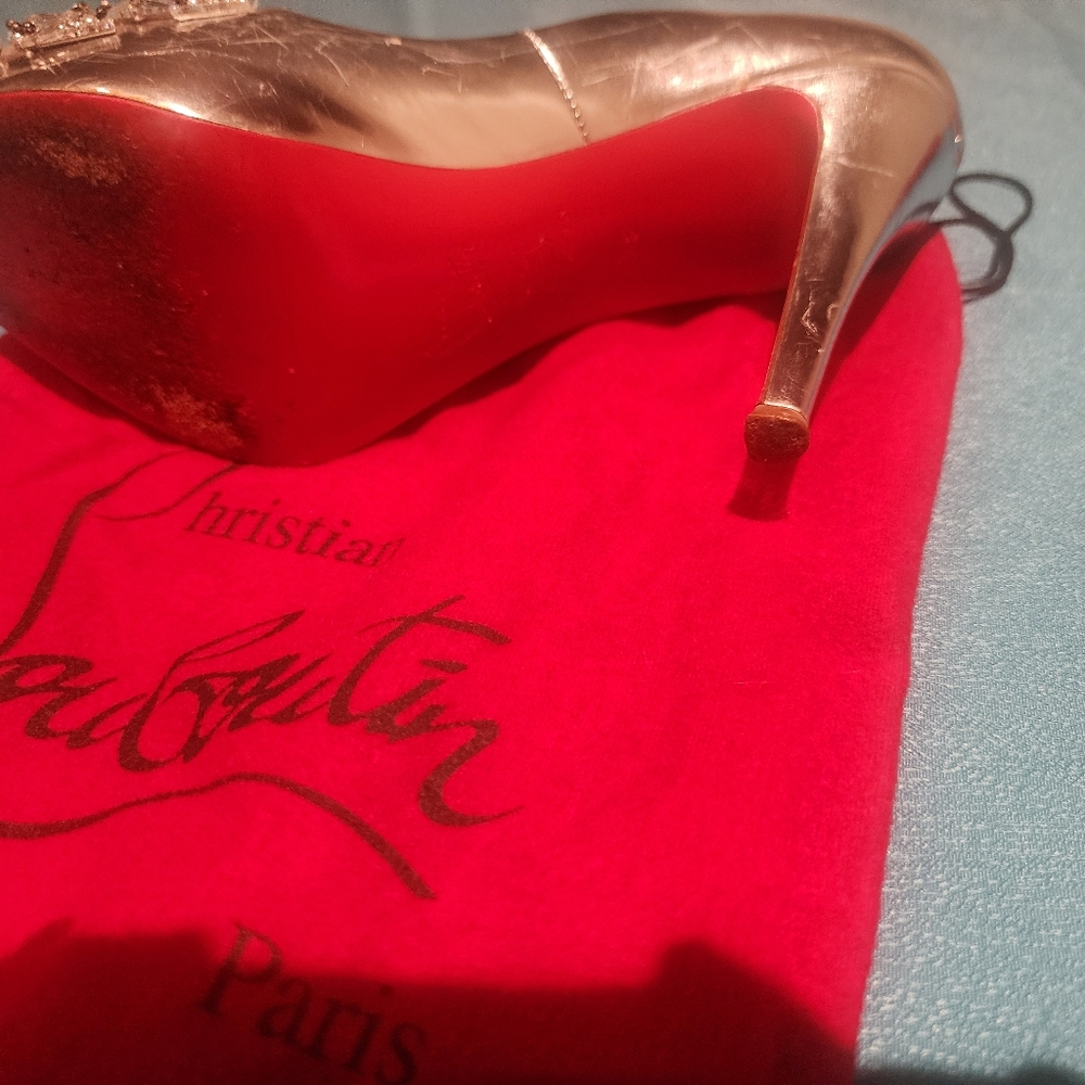 Authentic Christian louboutin bling pump size 38. Dust bag only, no box.